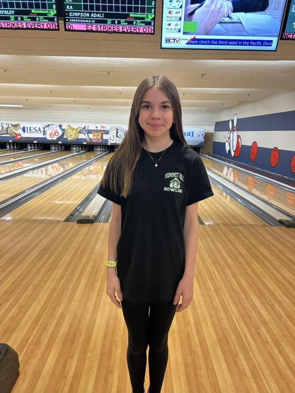 Spartan bowler at the Illinois Elementary School Association Girls State Bowling Tournament before competition.