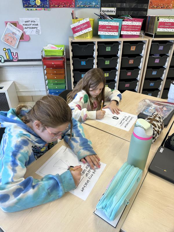 Students apply author’s claim to state position on teacher’s Halloween costume