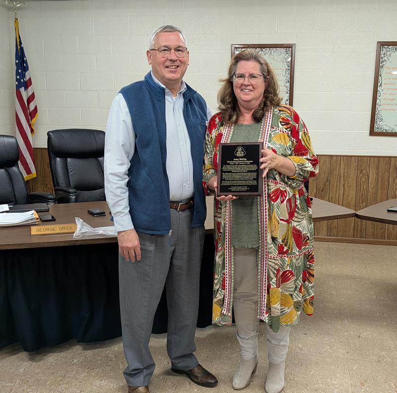 Presentation to Mrs DeFoe