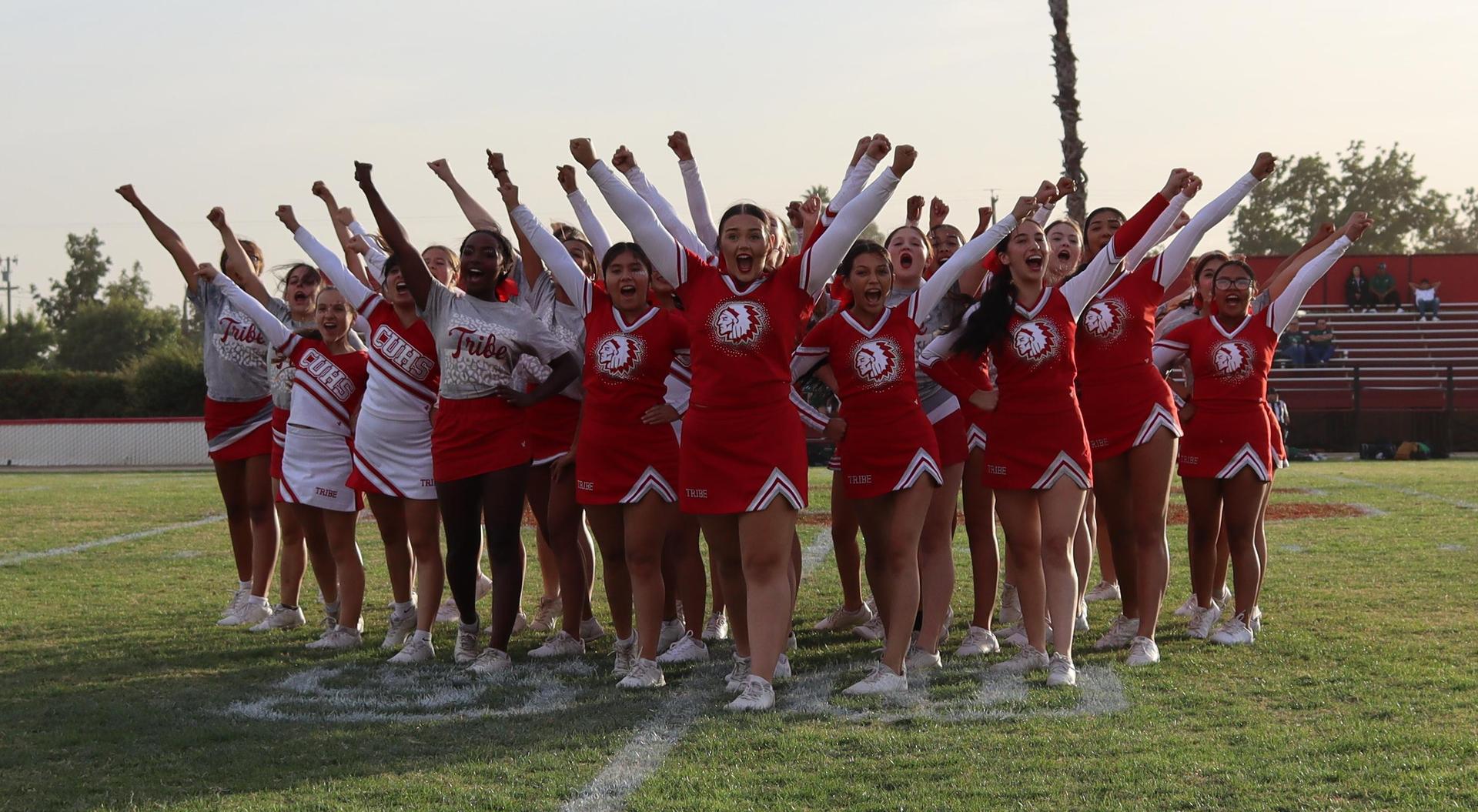 Cheerleaders performing at the football game