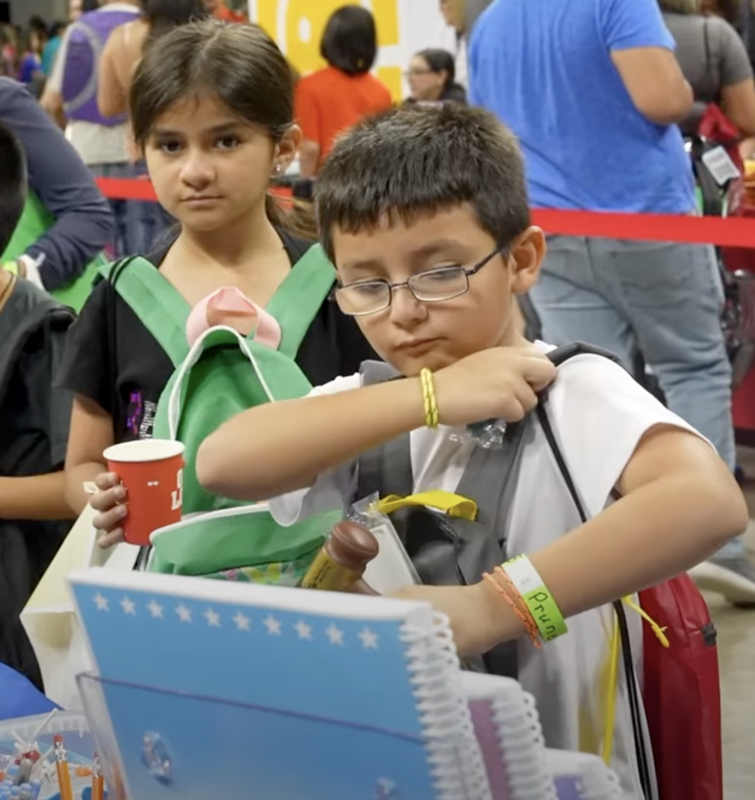Kid getting free school supplies