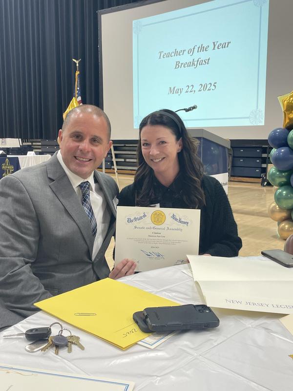 Dr. Roselli and Teacher of the Year Shannon Van Cora