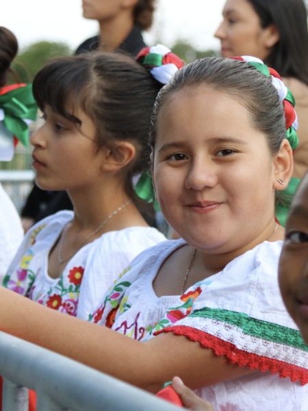 Young latinas in folklorico outfits