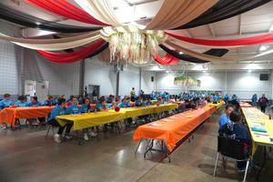 Students join community members at the Barry County Expo building for the opening of Day of Caring.