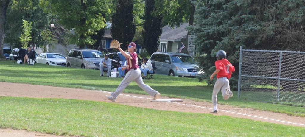 First-base player catches ball for an out.