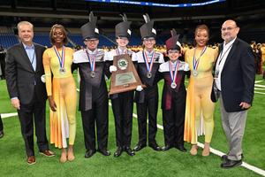 DHS Wolf Band receiving silver medal