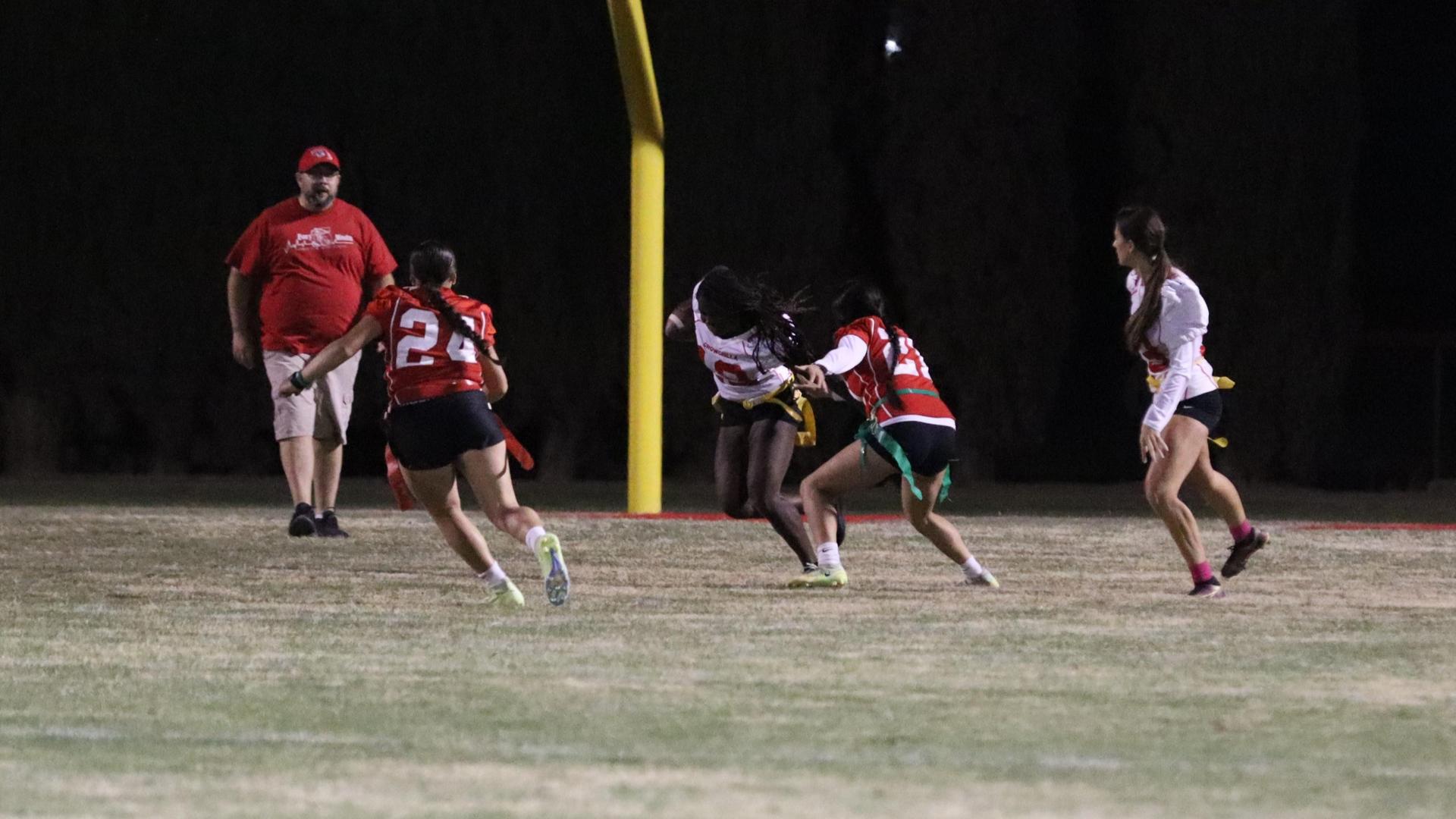 girls playing flag football