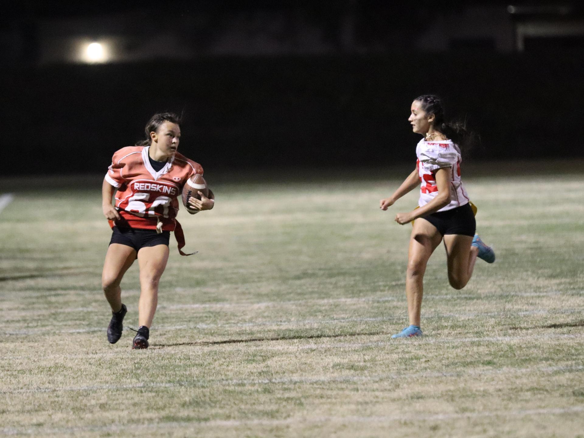 girls playing flag football