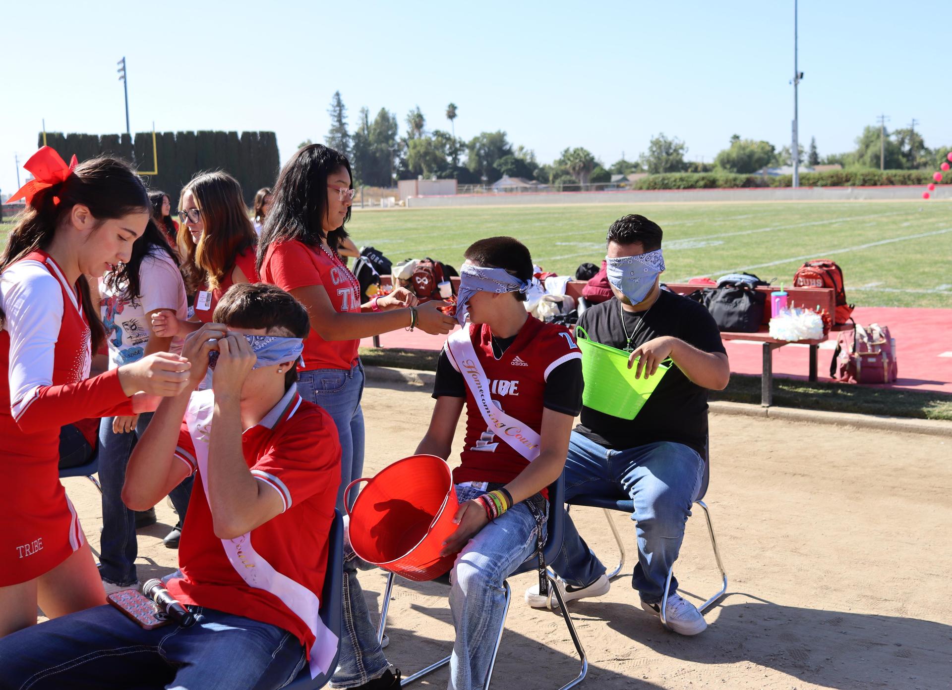 students and staff at the homecoming rally