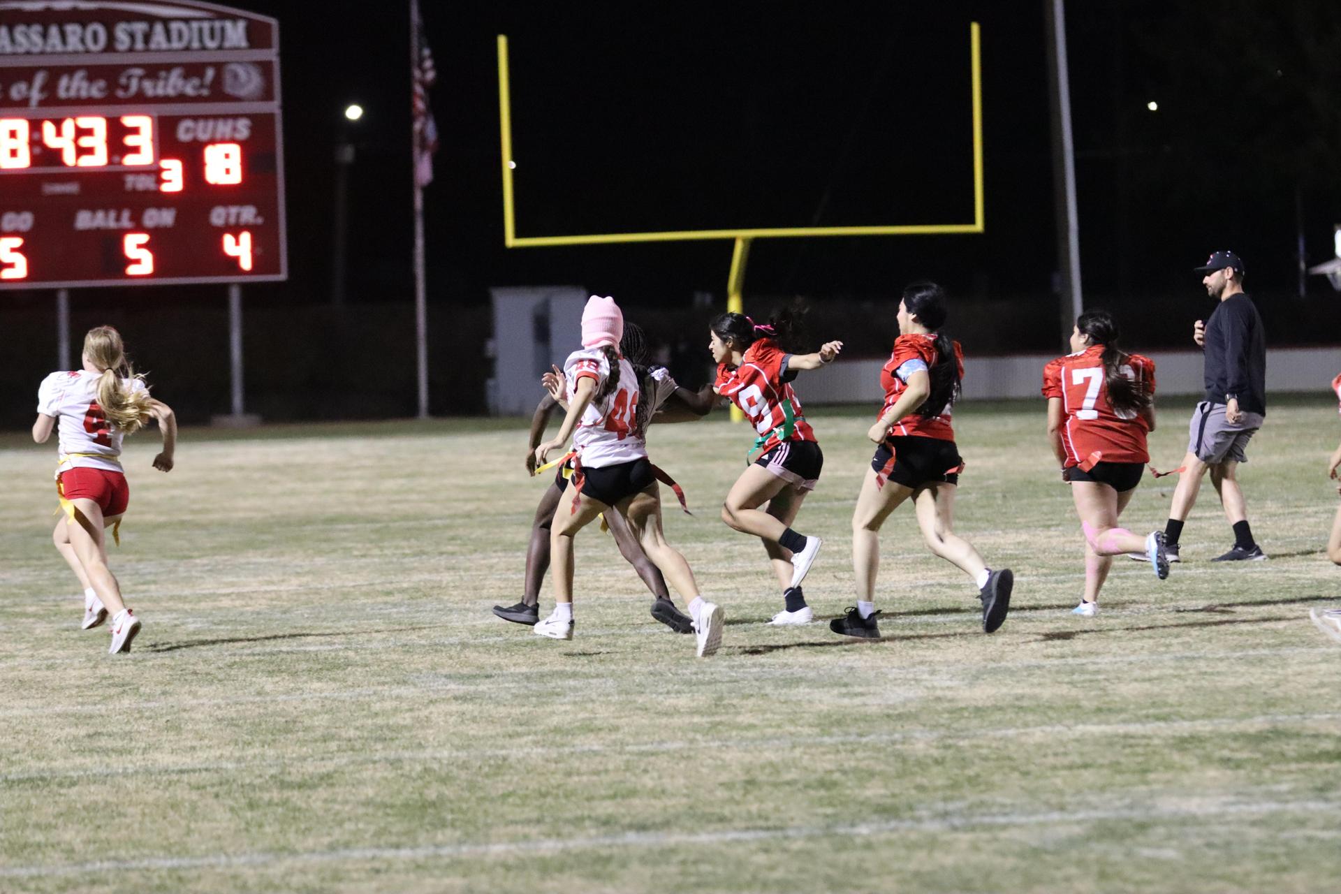 girls playing flag football