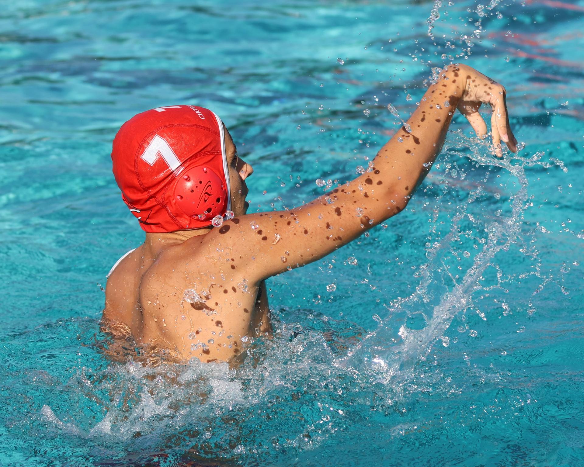 Boys playing water polo against Yosemite