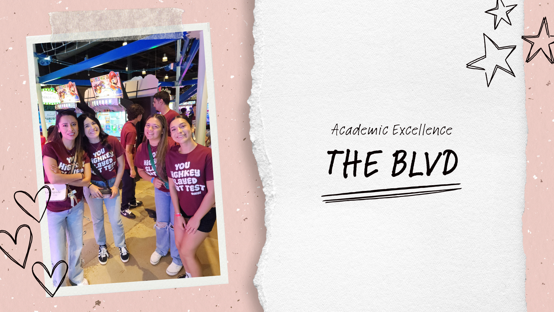 Group of smiling friends posing together at a fun venue with decorative elements.