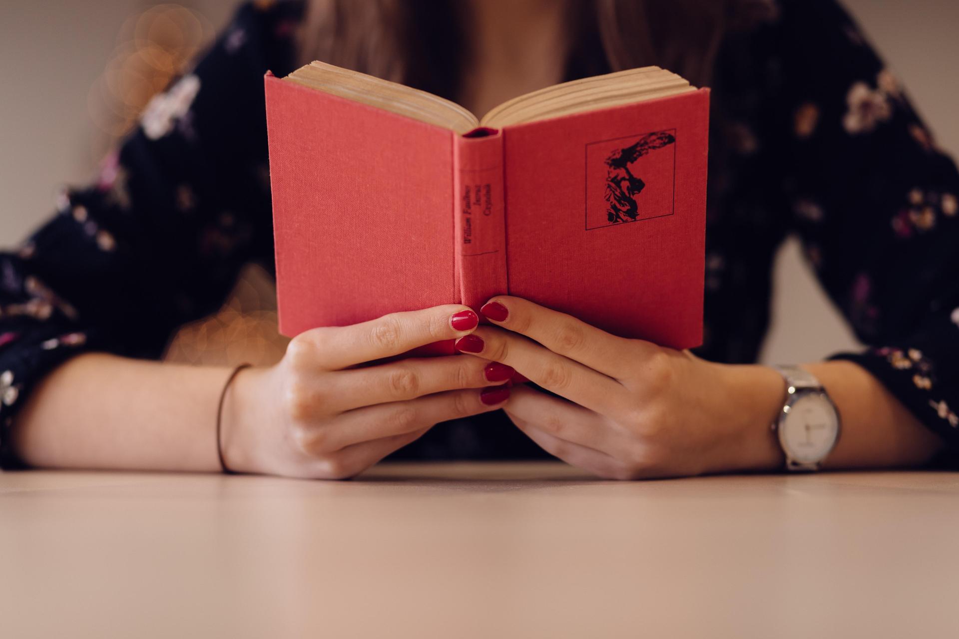 books in hands