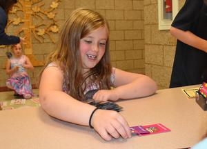 a student playing cards