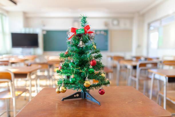 christmas tree on desk in a classroom