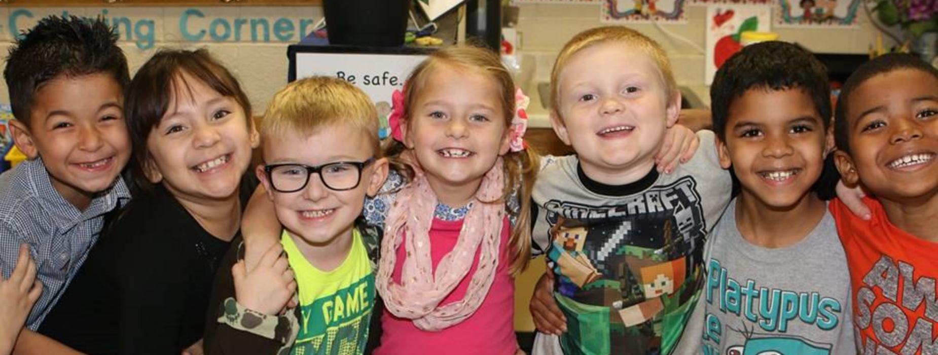 group of students smile for camera
