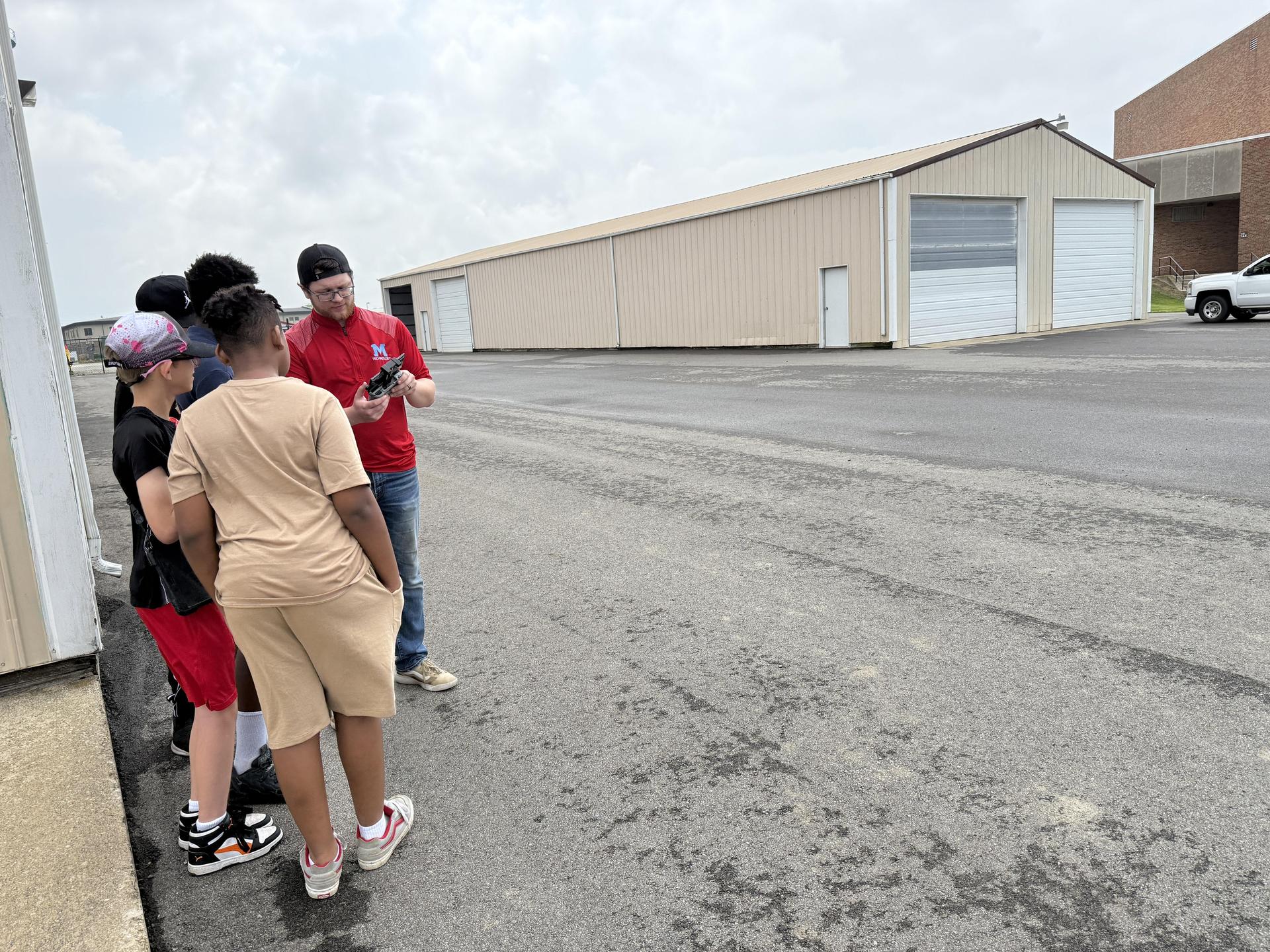 Tech Tribe students working or learning