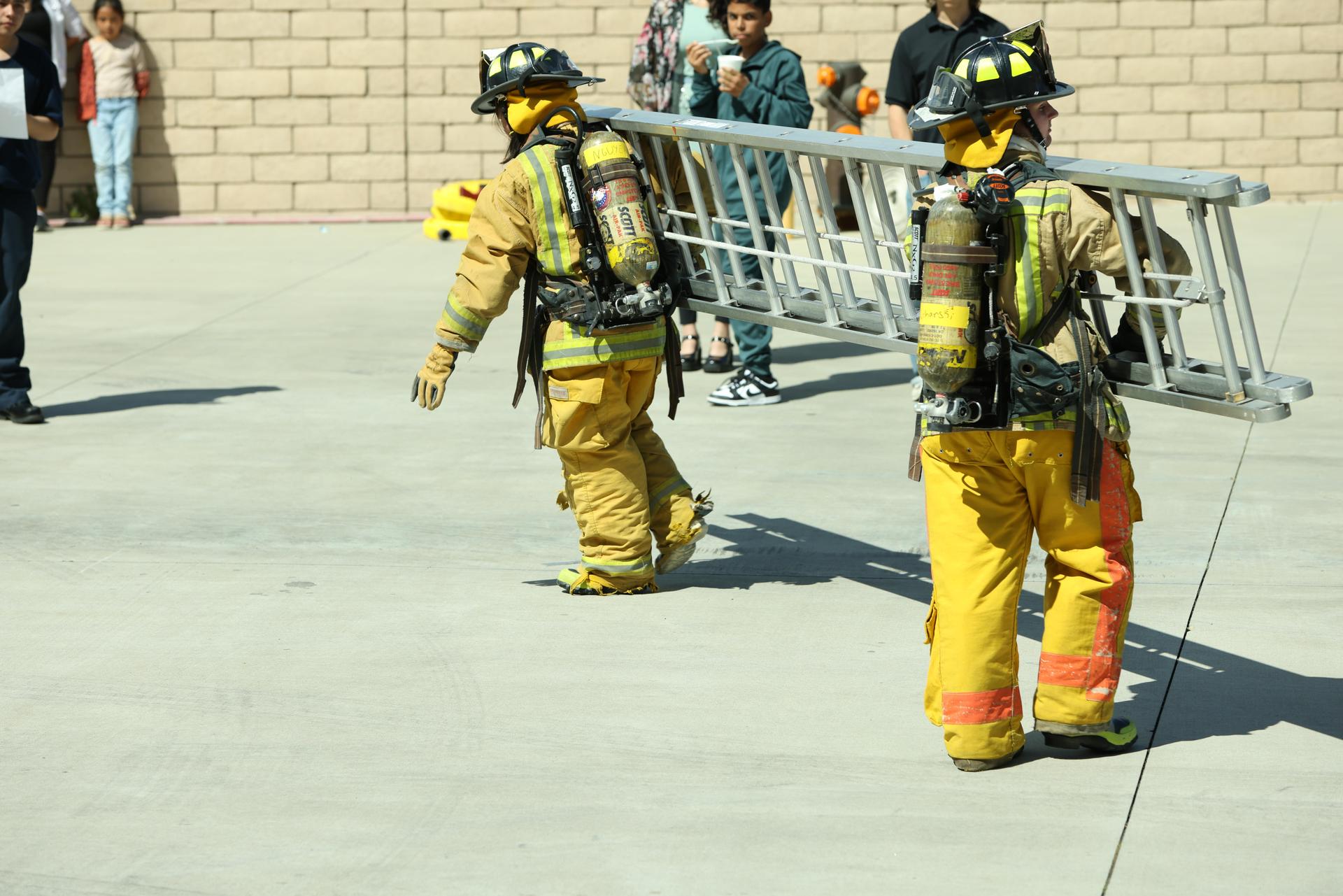 Fire Science students doing ladder drills