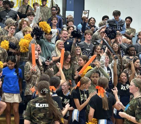 St. Joe students cheer on the football team at a pep rally,
