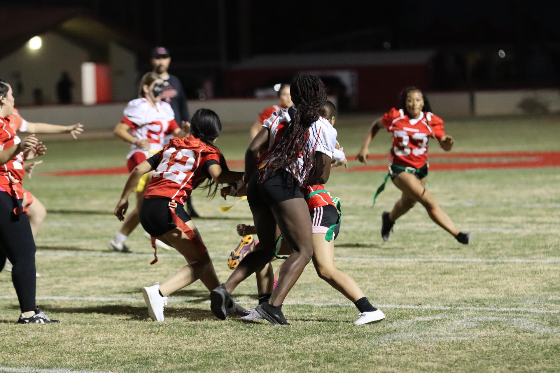 girls playing flag football