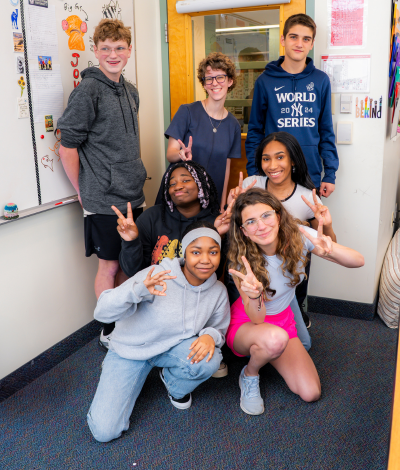 Upper School students and teacher posed for a photo