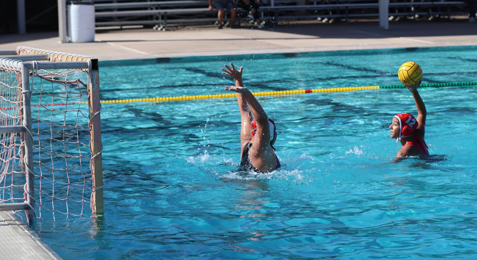 girls playing water polo against Hoover