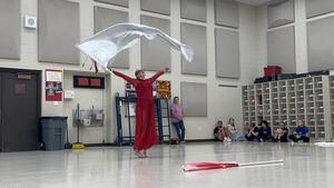 FHS color guard student performing