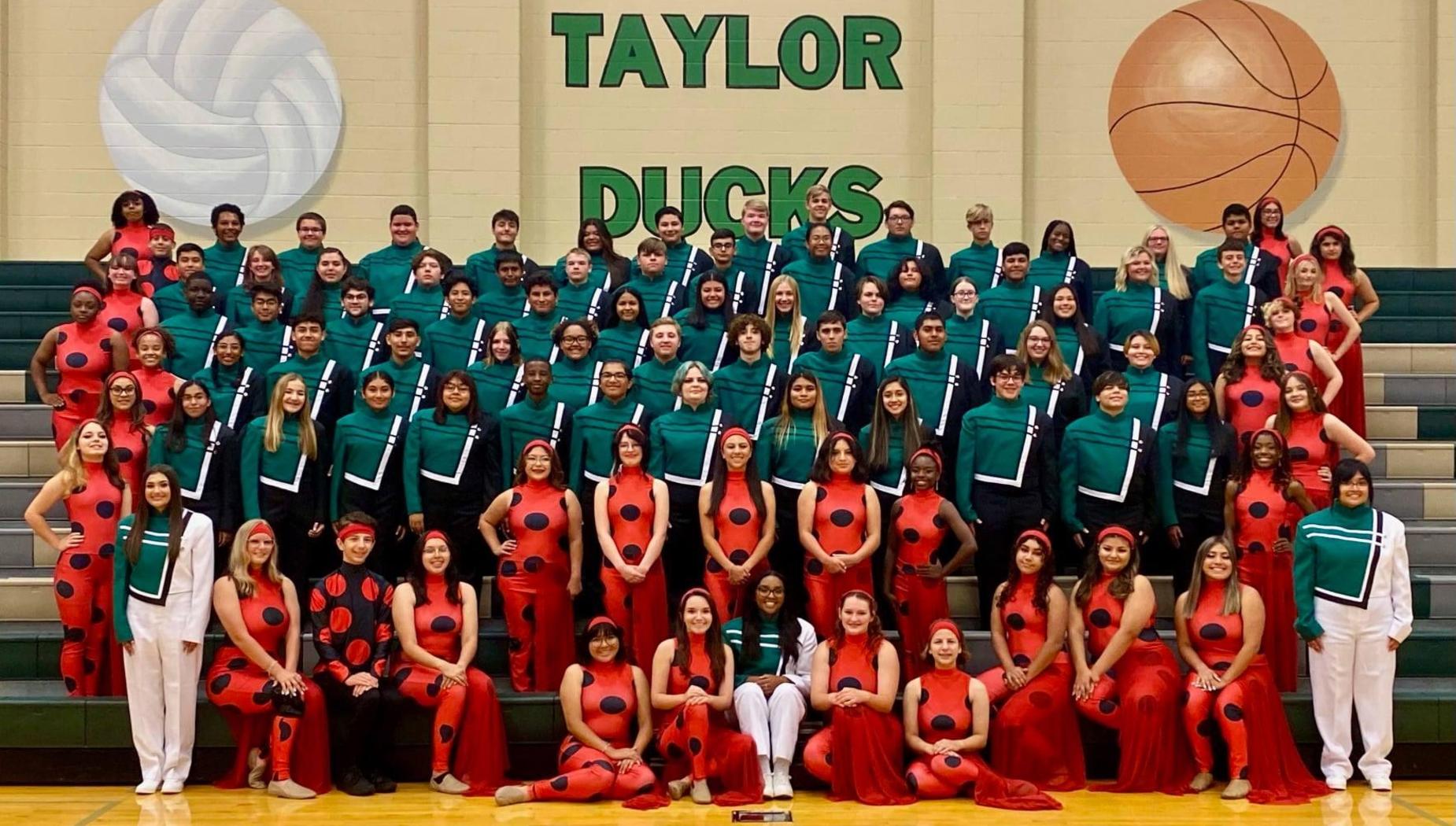 Taylor High School Ducks band and color guard