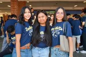 Walnut High School students wearing “Saddle Up” shirts pose for a photo on the first day of school.