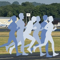 image of runners at Beverly Regional Airport
