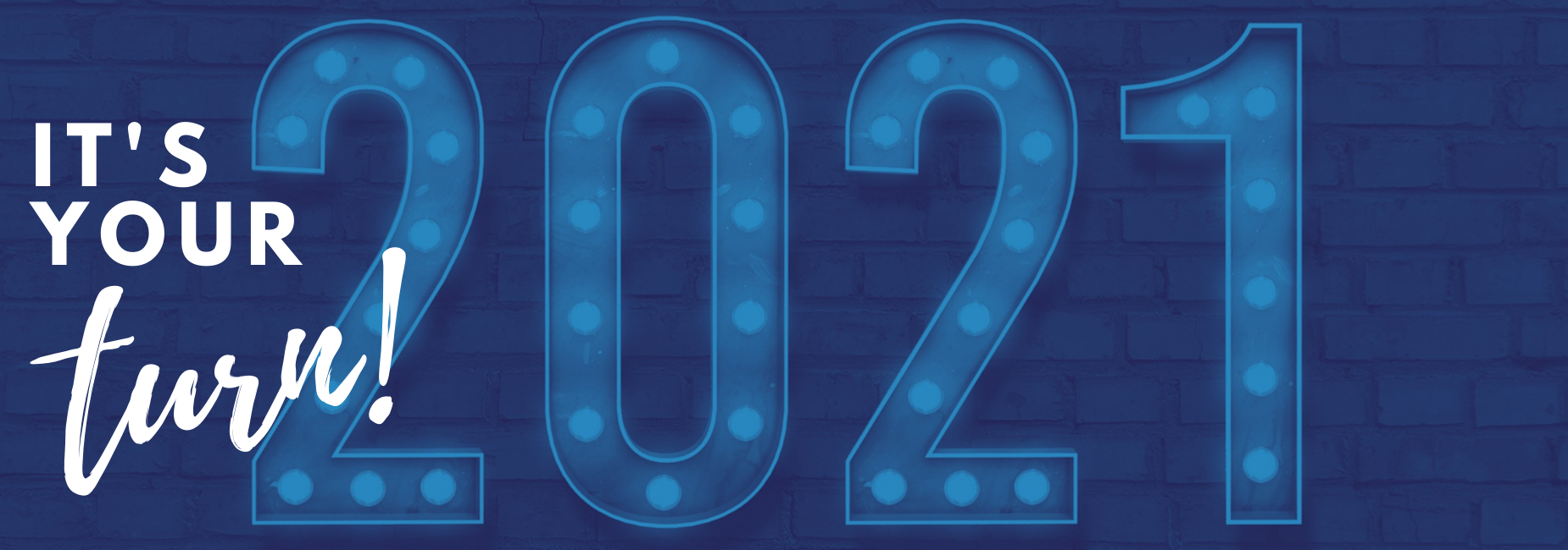 lighted 2021 numbers on graphic that reads it's your turn!
