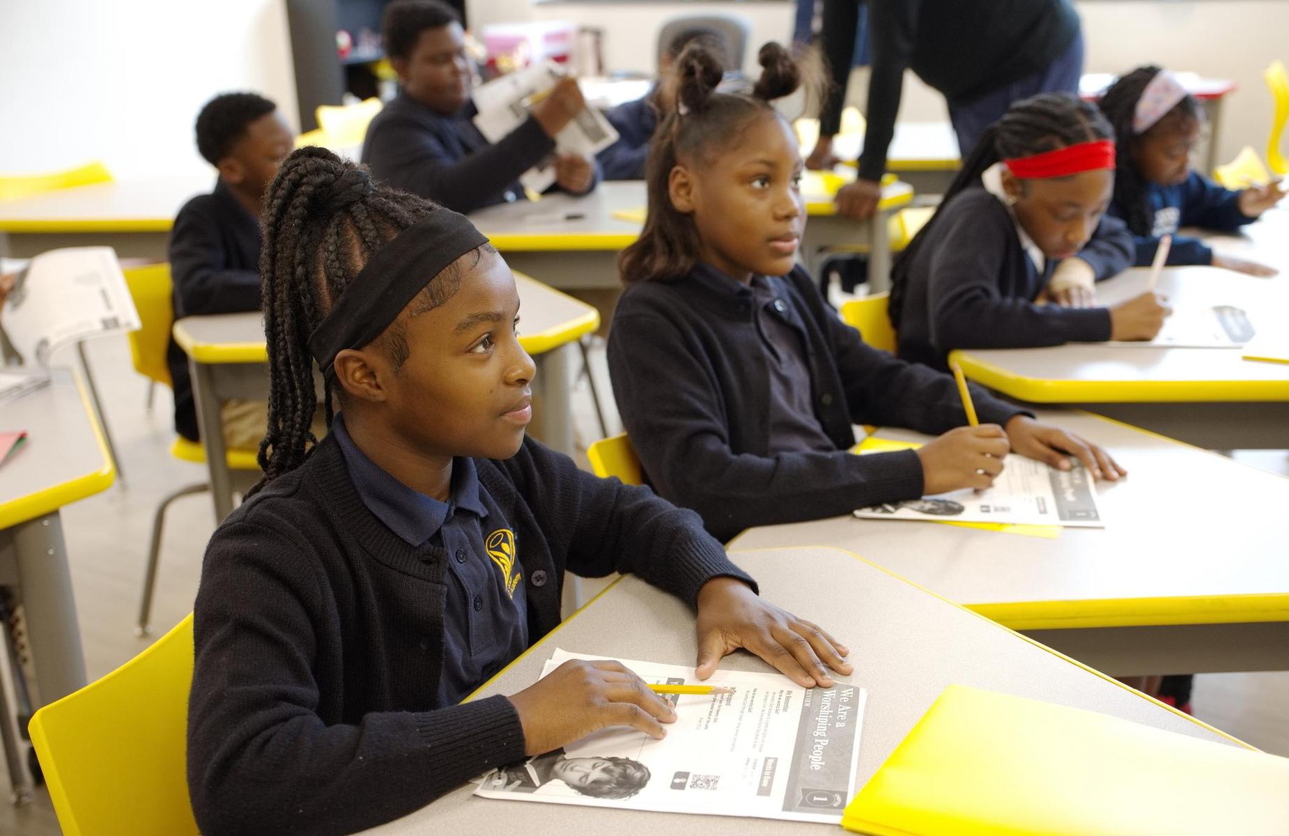 Students at yellow desks