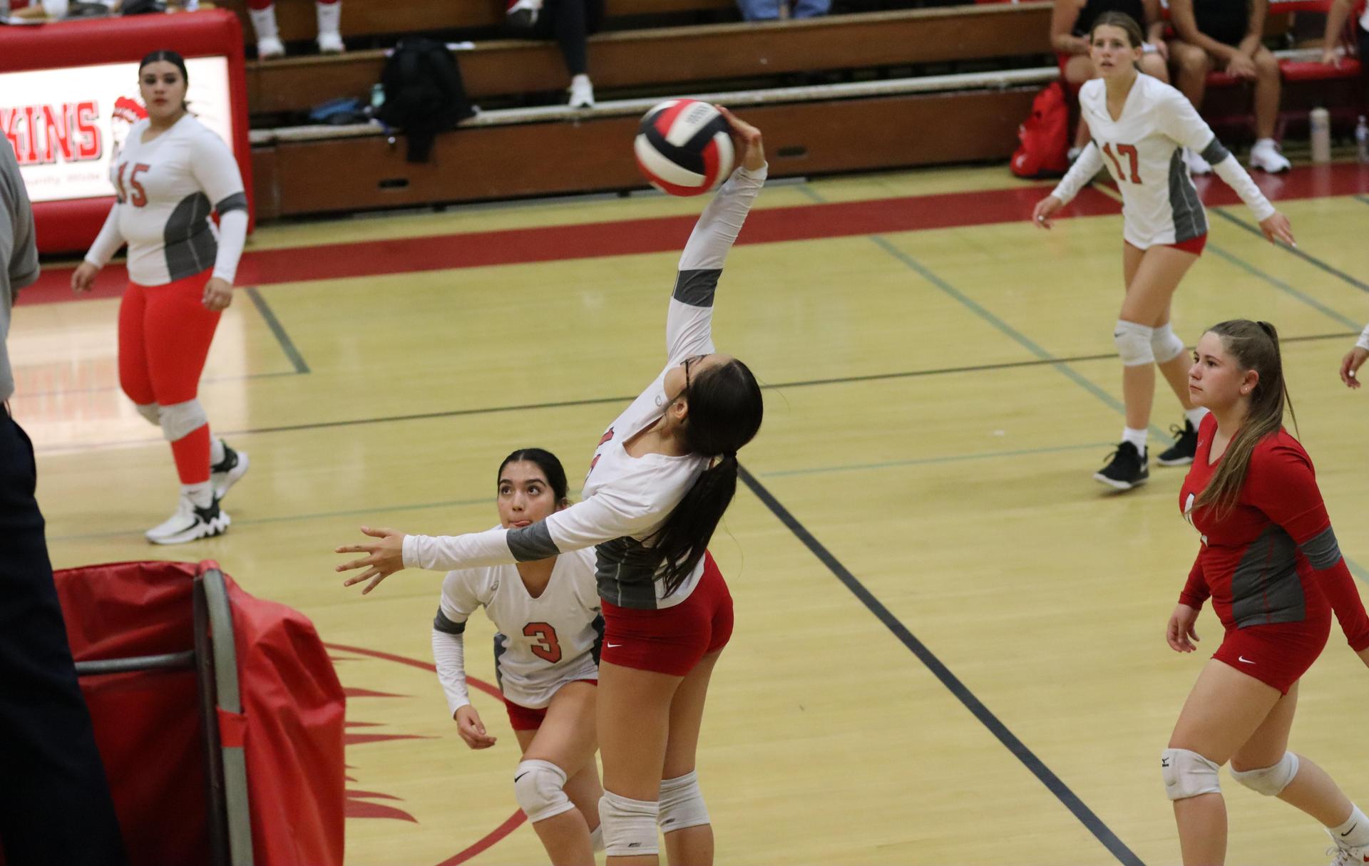 junior varsity girls playing volleyball against Liberty