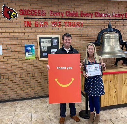 McKinzie Gregory is pictured receiving an honor from McDonald's