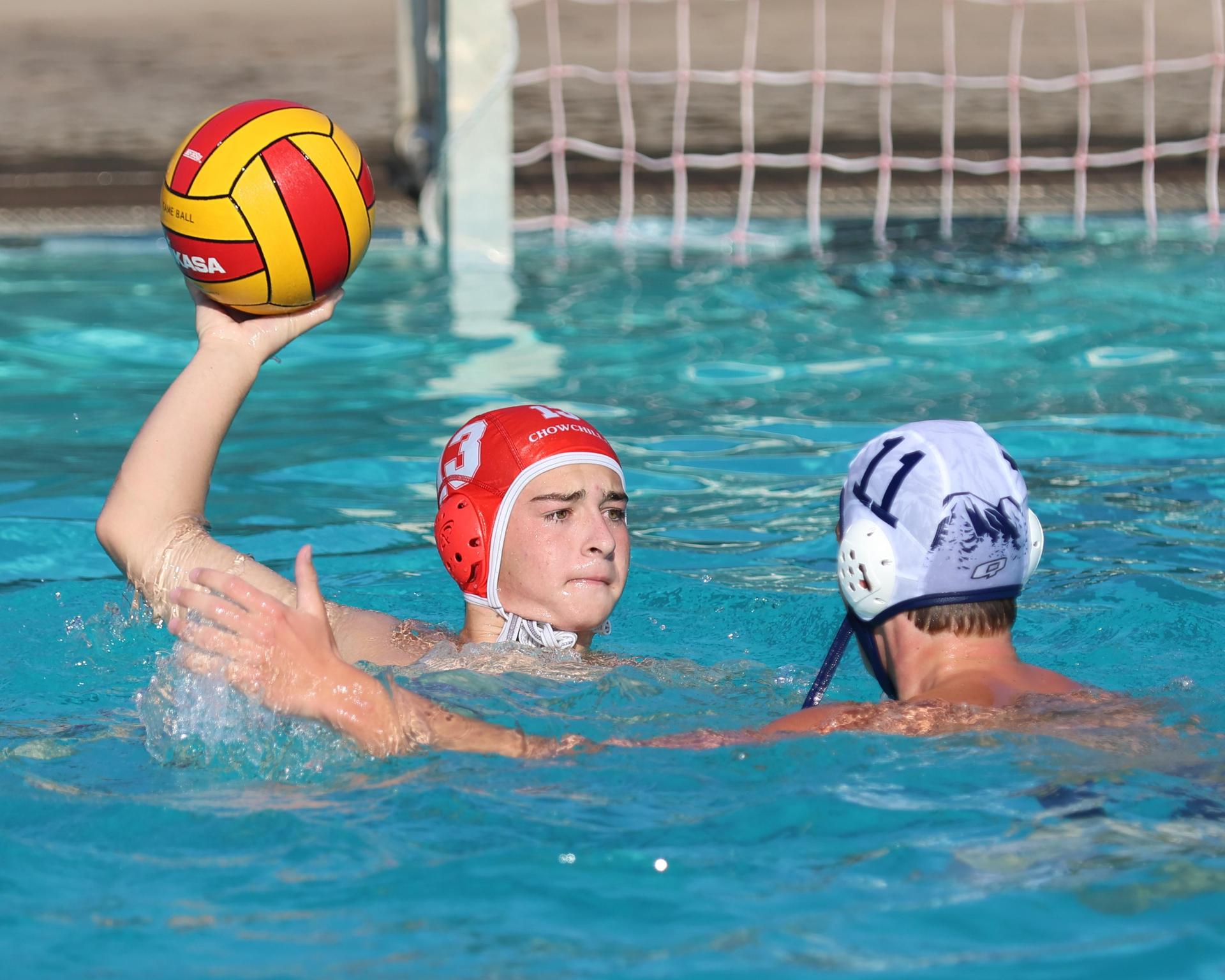 Boys playing water polo against Yosemite