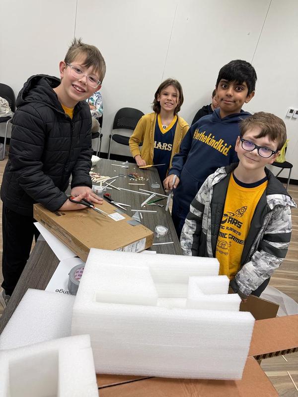Four students posing for a photo.