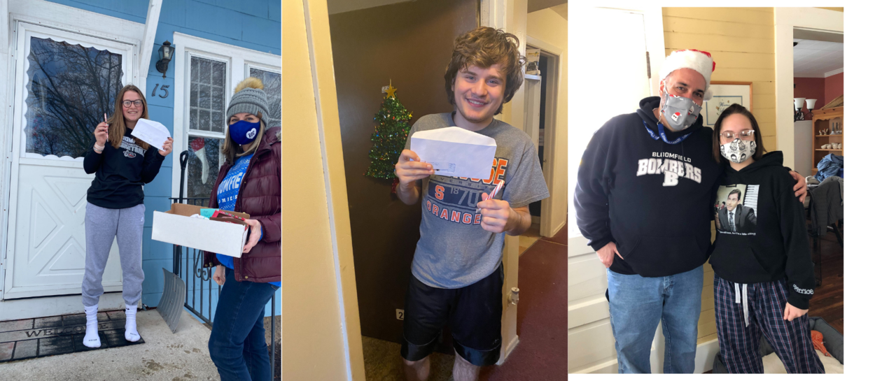 students getting letters from staff