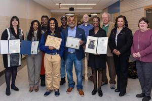 Xaiveyon poses for a photo with the group