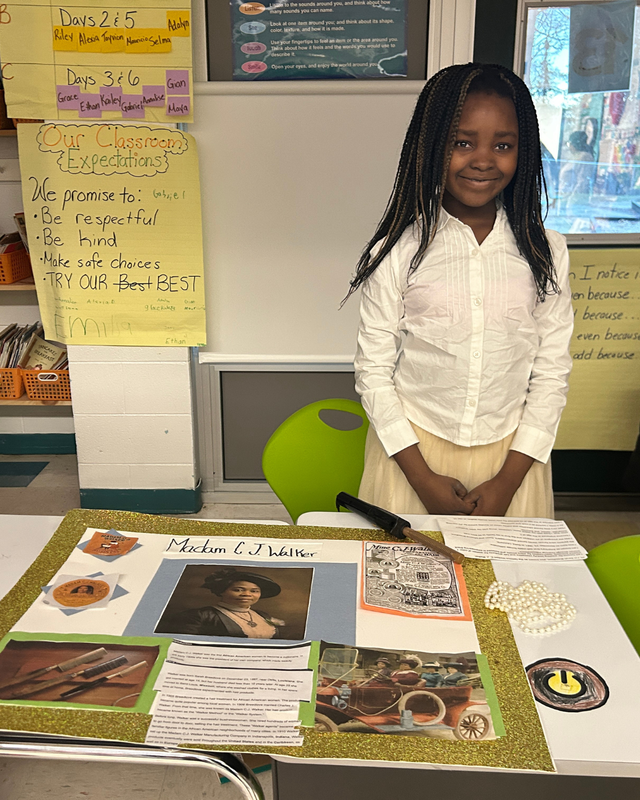 Young student shows her work