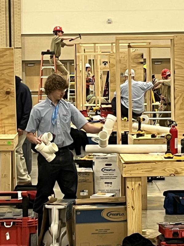 Students working in construction setting