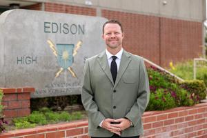 photo of Matt White in front of Edison High School
