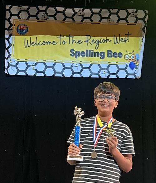Arva Parikh with Spelling Bee trophy