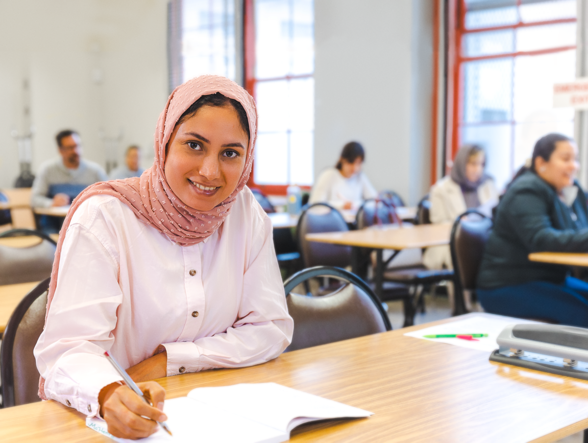 ESL student working with a classmate.
