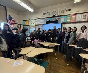a group photo of students, teachers, and Edwin D’Angelo