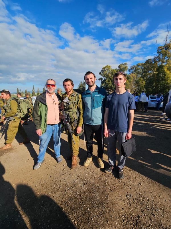 TDSA Alum, his father Chuck Diener and his brothers celebrate the completion of his IDF training.