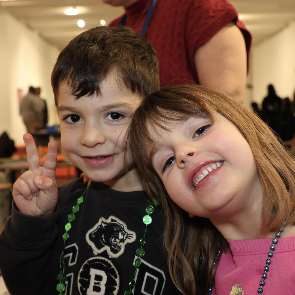 Two children taking photo