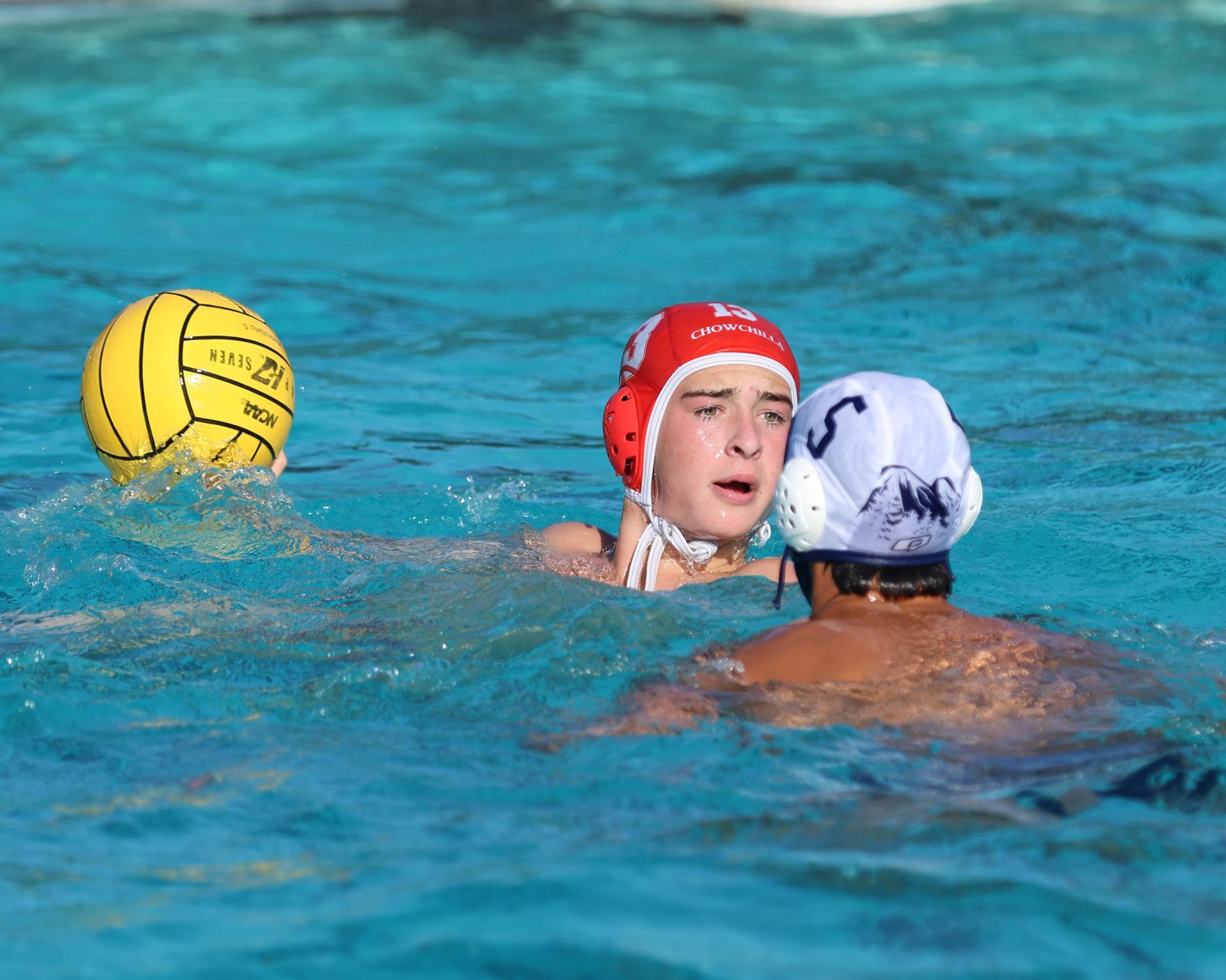 Boys playing water polo against Yosemite