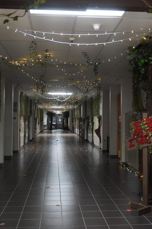 A hallway turned into an enchanted forest.