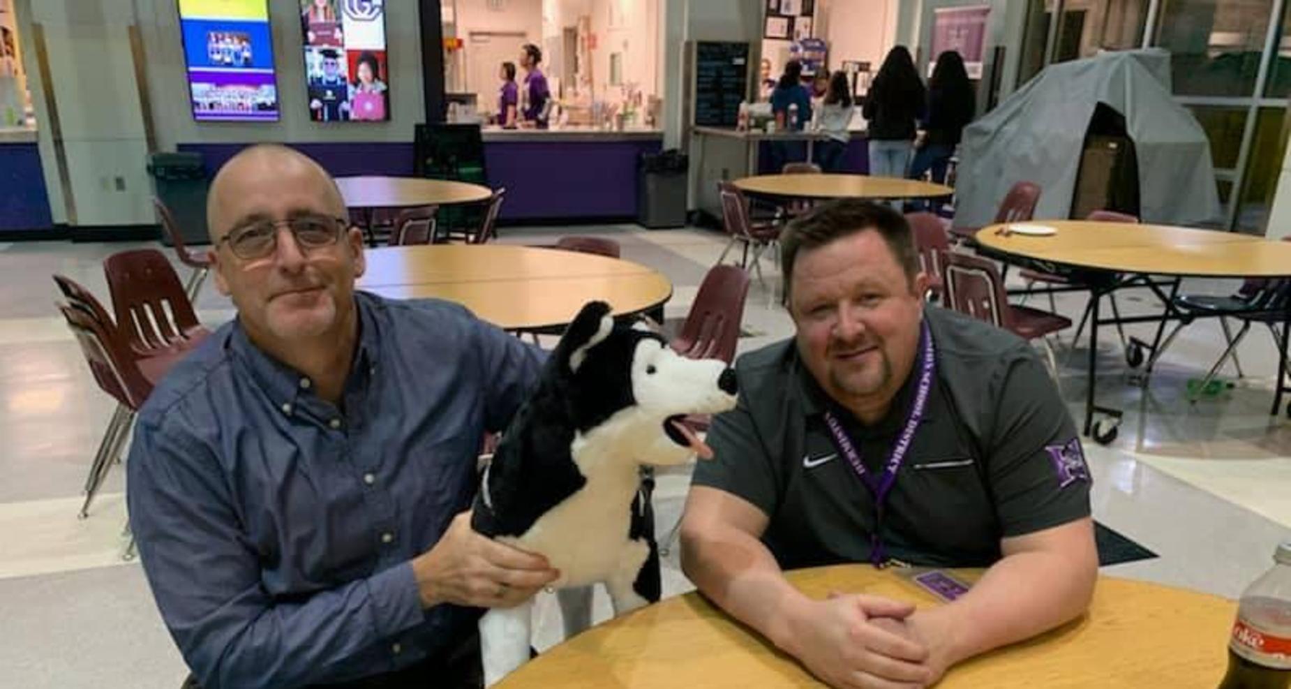 Mr. Spoo and Mr. Usher with Husky dog.