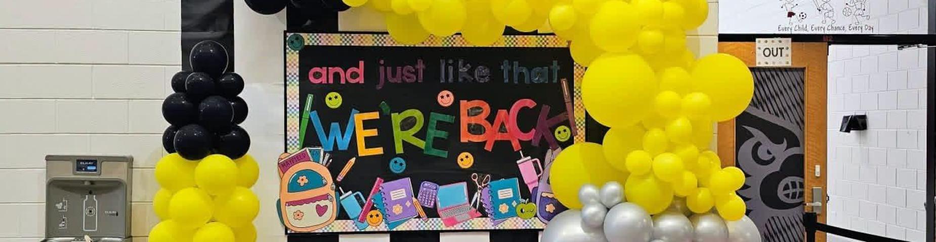 Balloon decorations for back to school in the front hallway